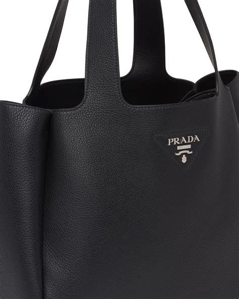 does prada use real leather|prada leather tote bag.